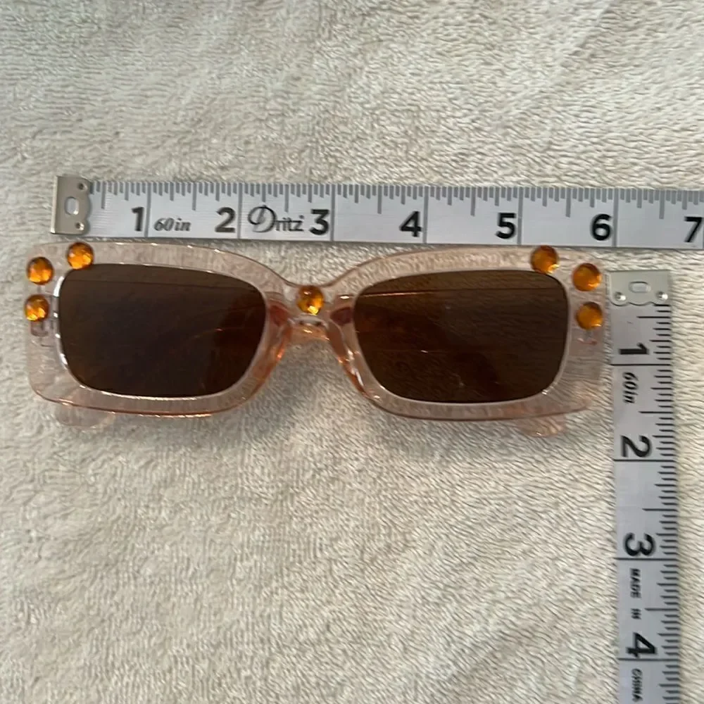 NWOT unbranded plastic squarish tan clear sunnies with rhinestone embellishments